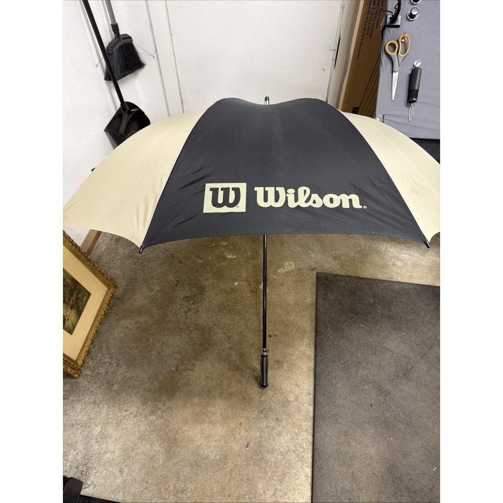 Wilson double canopy golf umbrella in a black and tan color combination